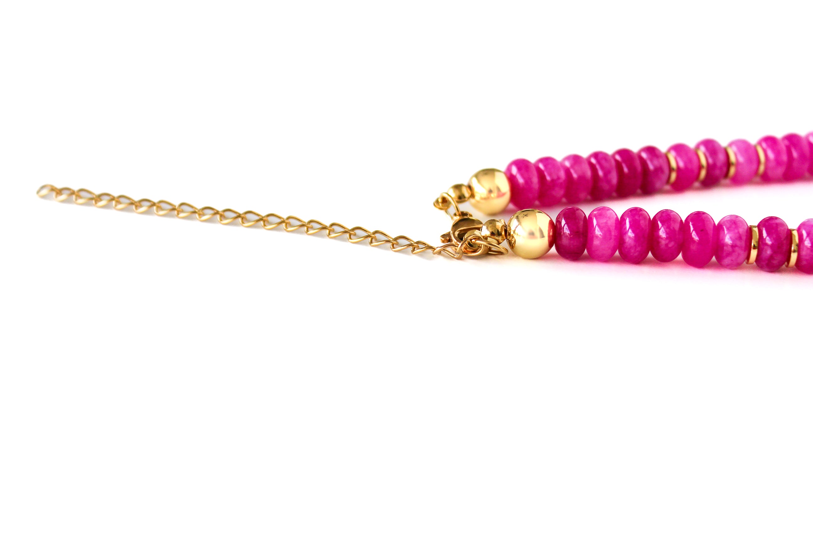 a pair of pink and gold beaded necklaces